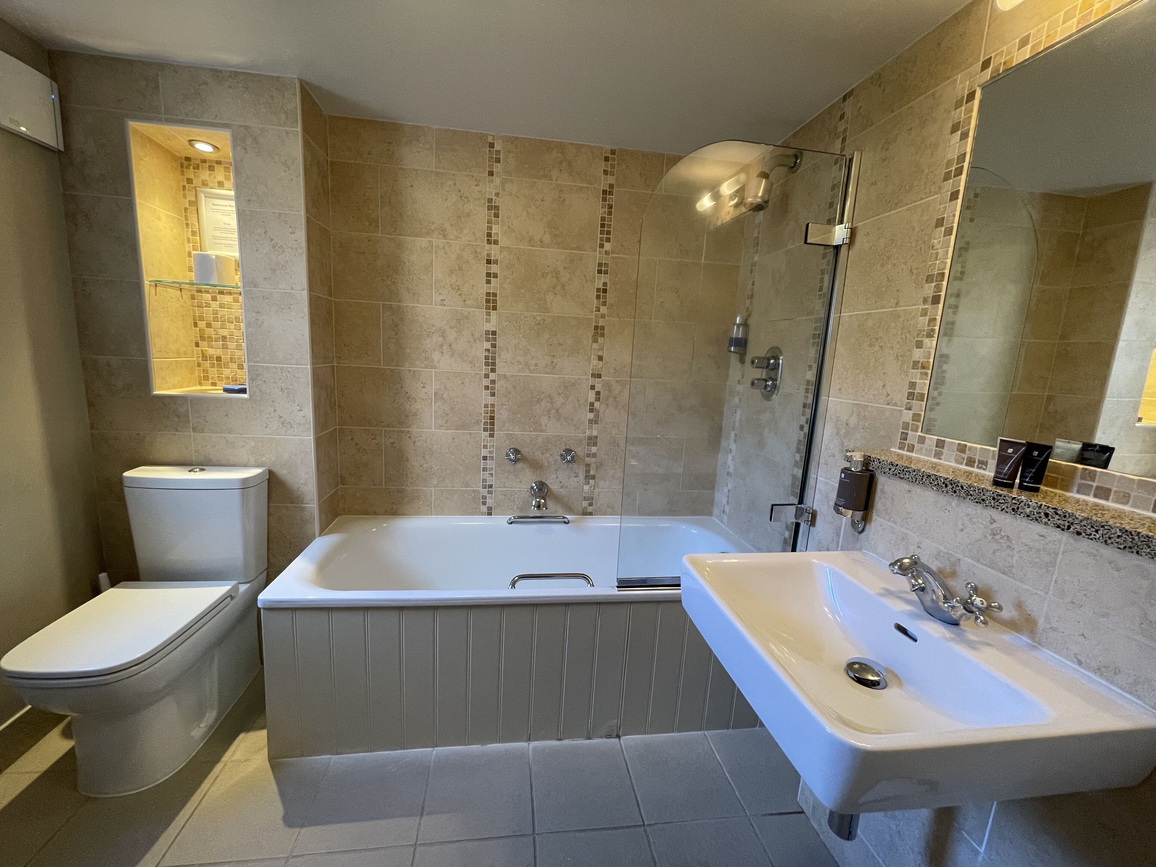 barn deluxe room | bathroom | combined shower/bathtub, hair dryer, towels