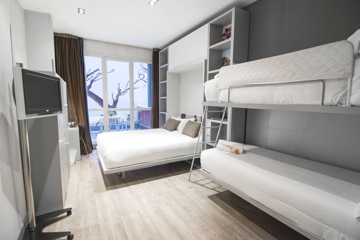 Quadruple Room | Minibar, in-room safe, desk, free WiFi