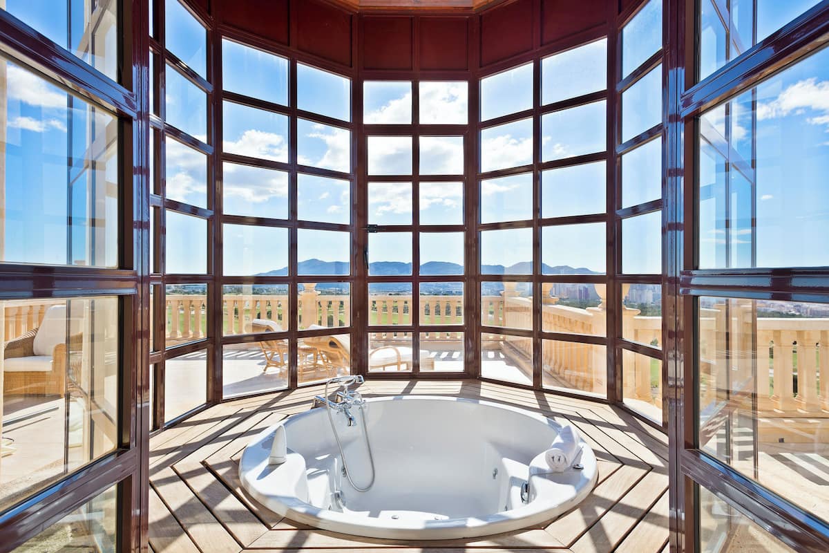 deep-soaking bathtub, rainfall showerhead, free toiletries, hair dryer