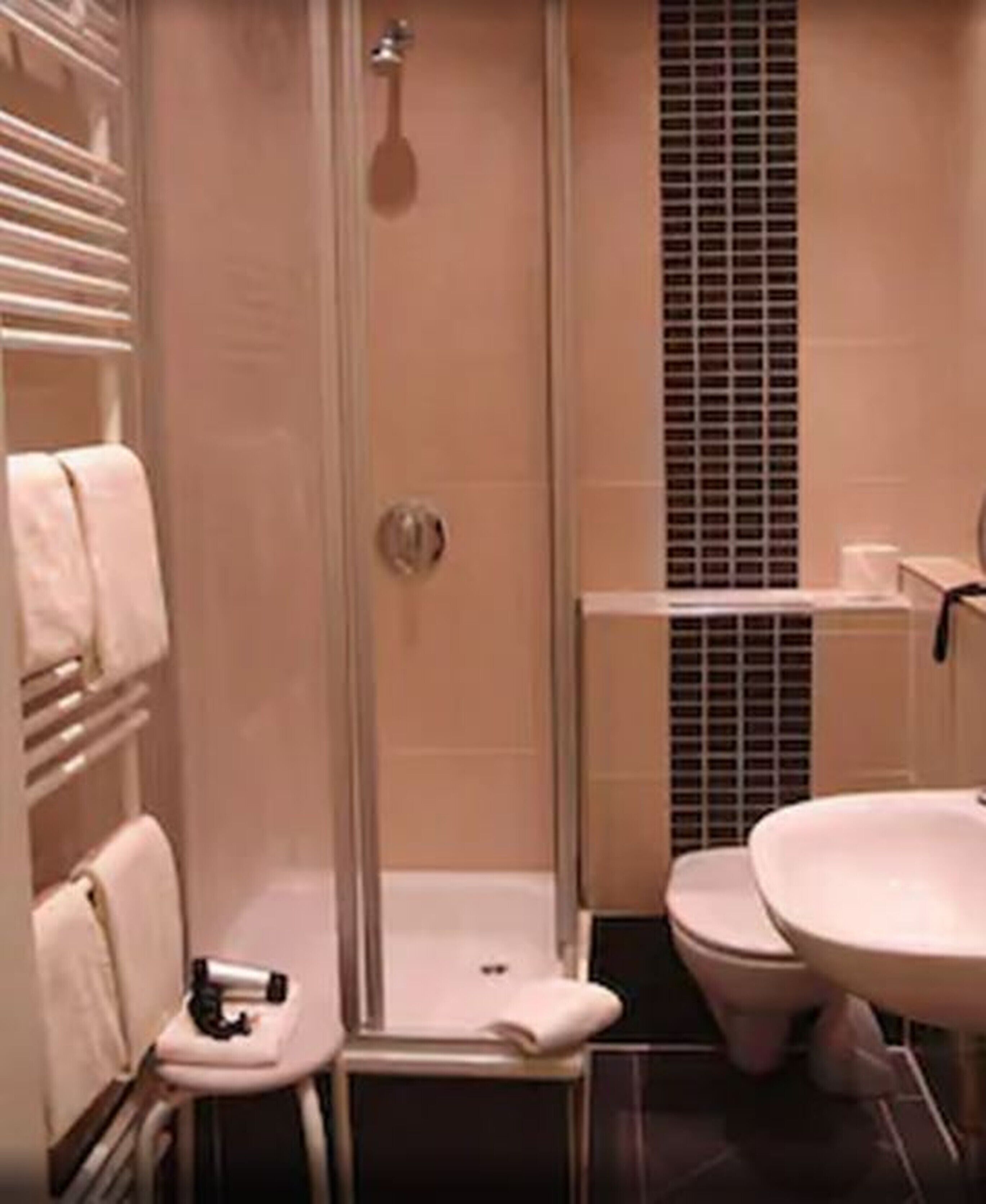 hair dryer, dressing gowns, slippers, towels