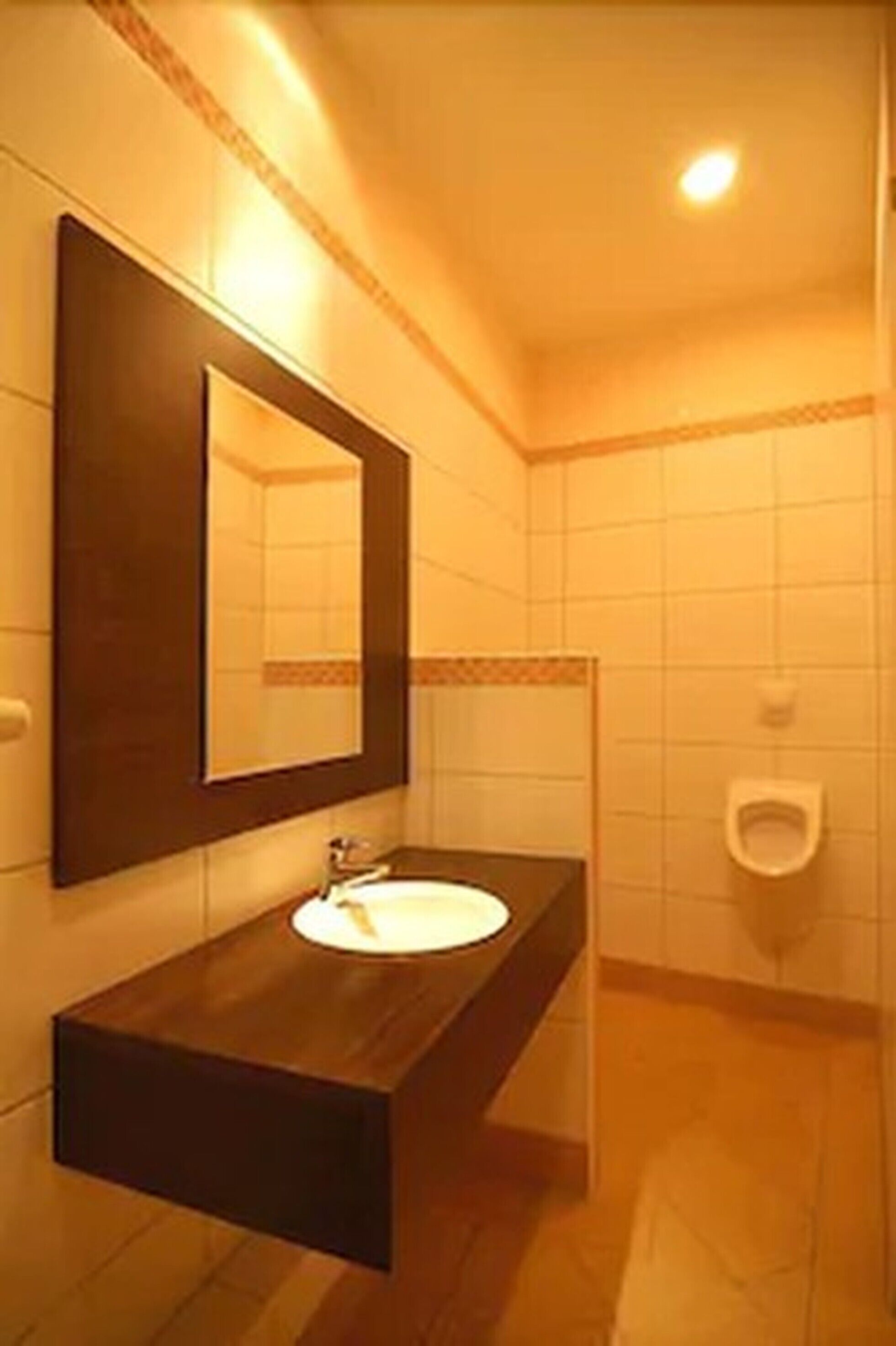 hair dryer, dressing gowns, slippers, towels