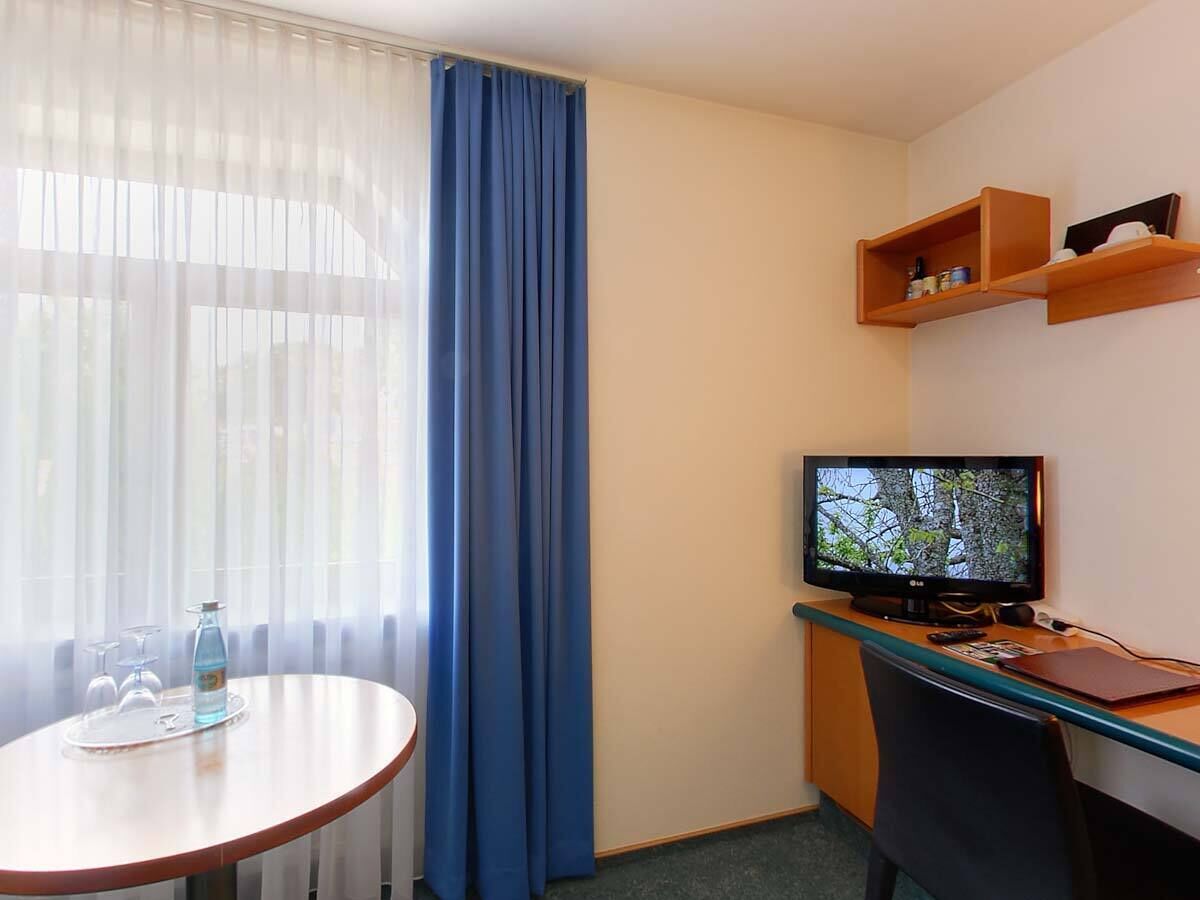 Standardzimmer, 1 Einzelbett | Allergikerbettwaren, Minibar, Zimmersafe, Schreibtisch