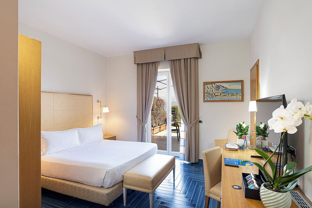 Deluxe Room, Terrace, Sea View | Frette Italian sheets, premium bedding, minibar, in-room safe