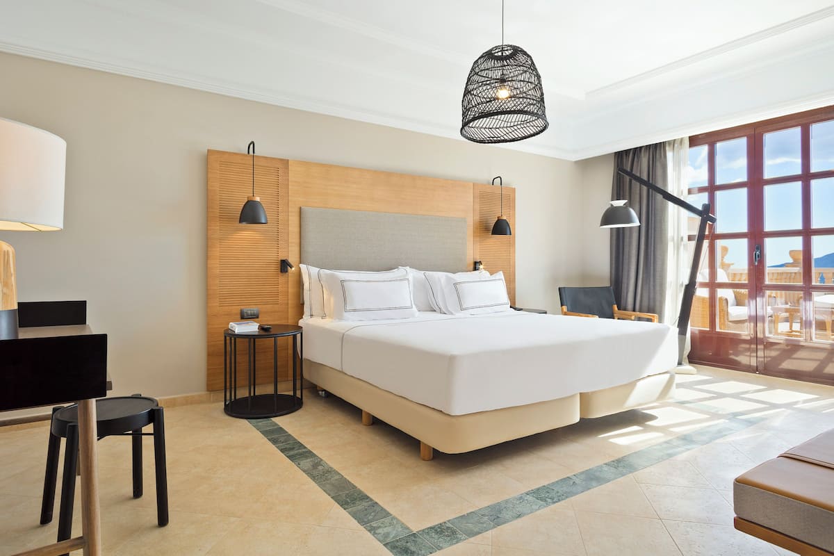 Premium bedding, down comforters, minibar, blackout drapes