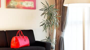 Triple Room, 3 Twin Beds | Living room | LCD TV, pay movies