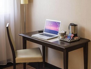 In-room safe, individually decorated, desk, blackout curtains