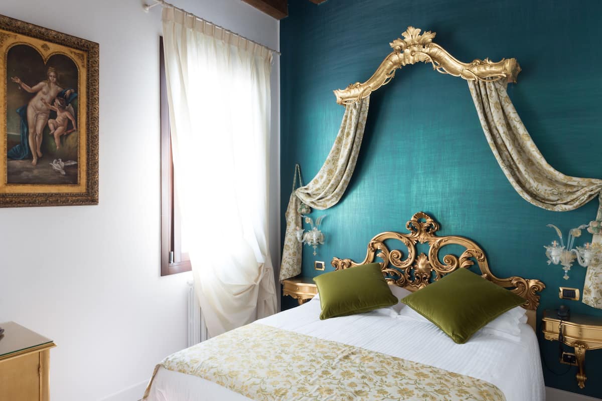 Down comforters, minibar, in-room safe, individually decorated