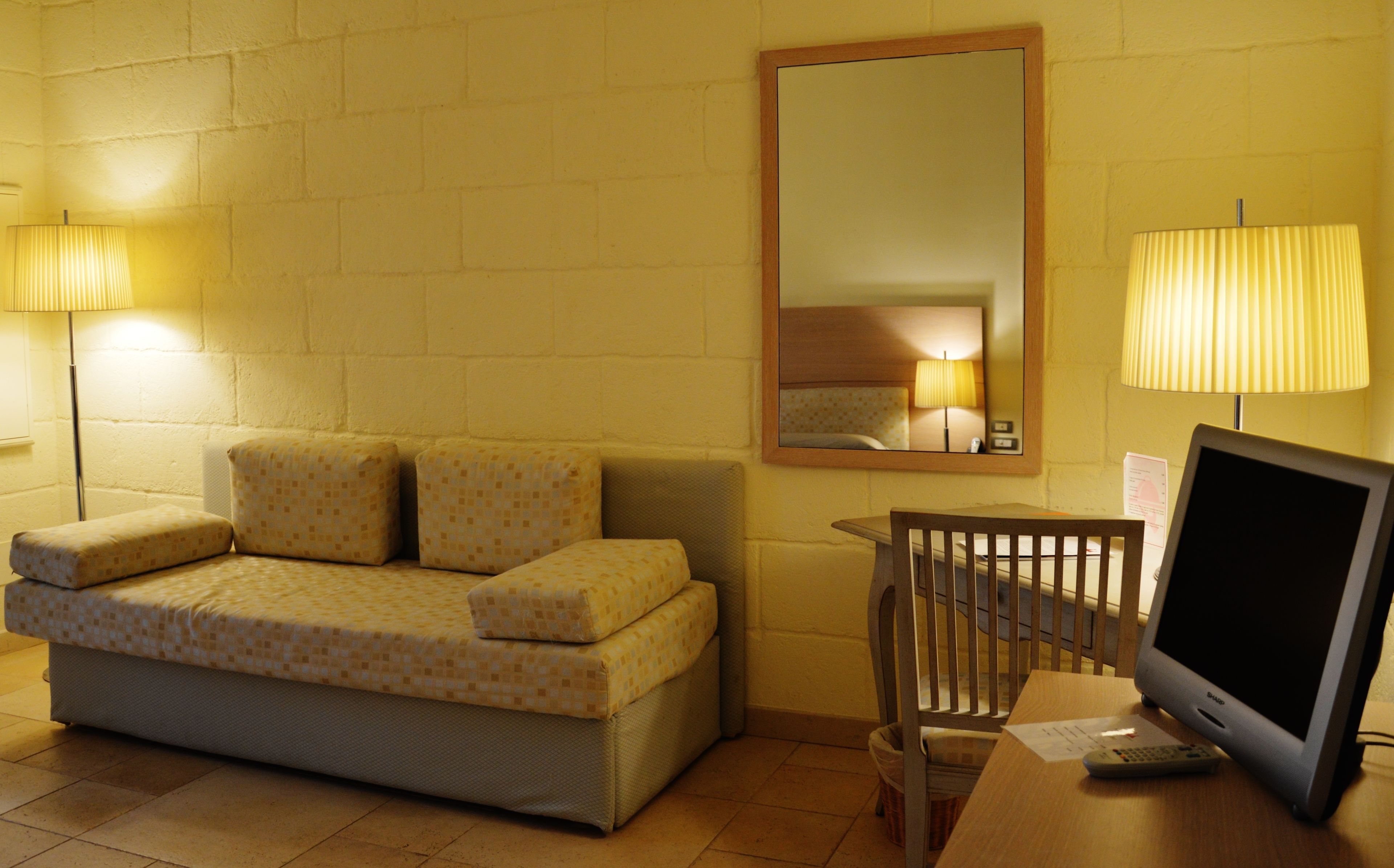 superior room, terrace, garden view | living area | flat-screen tv