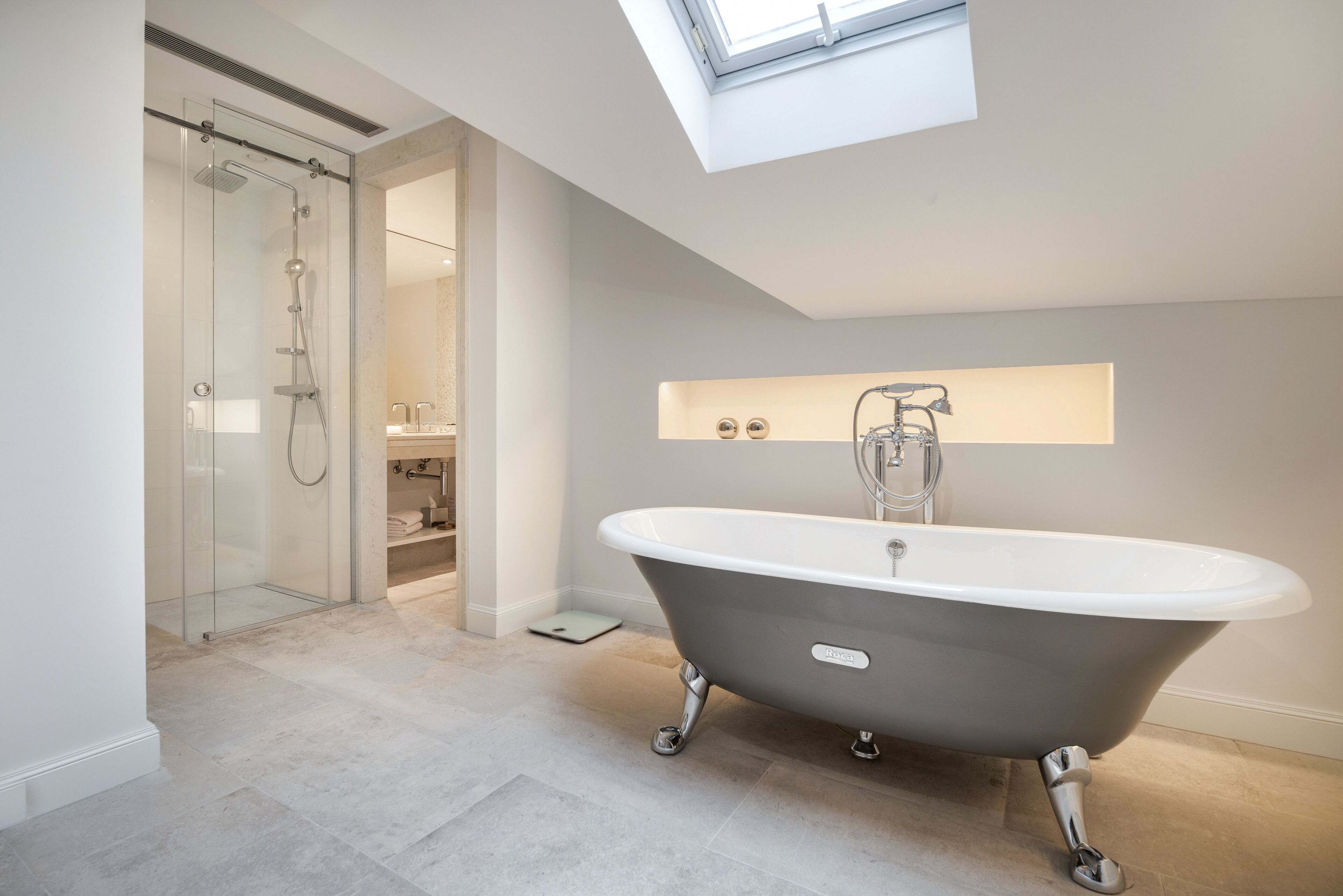 deluxe two bedroom suite | bathroom | free toiletries, hair dryer, bathrobes, slippers