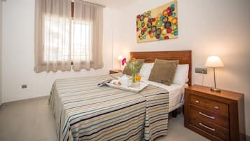 2 dormitorios, tabla de planchar con plancha, wifi y ropa de cama