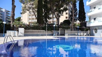 Outdoor pool, pool umbrellas, pool loungers