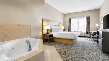 Suite, 1 trÚs grand lit, non-fumeurs, baignoire à jets | Literie de qualité supérieure, bureau