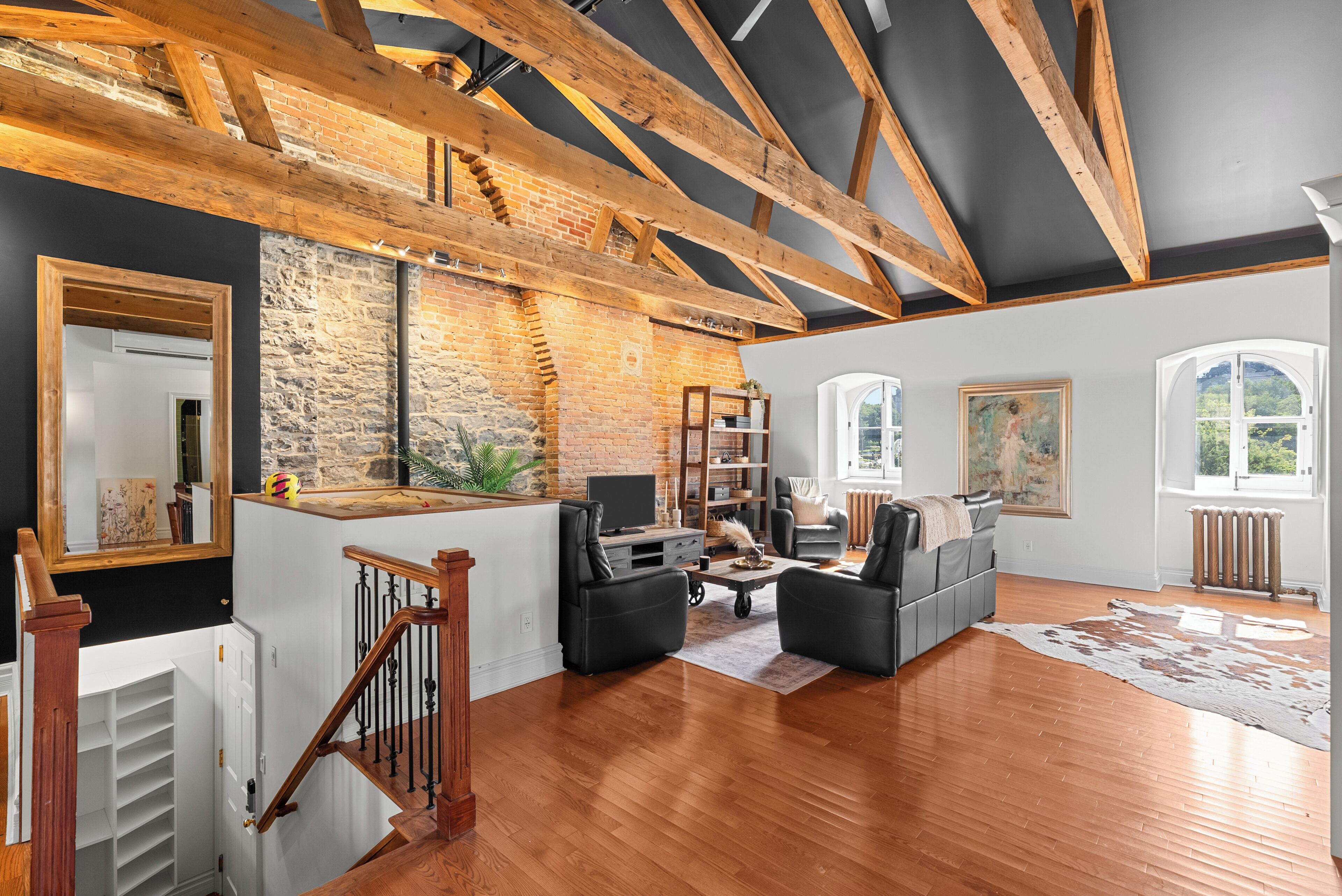 grand apartment | living area | 50-inch flat-screen tv with cable channels, tv, books