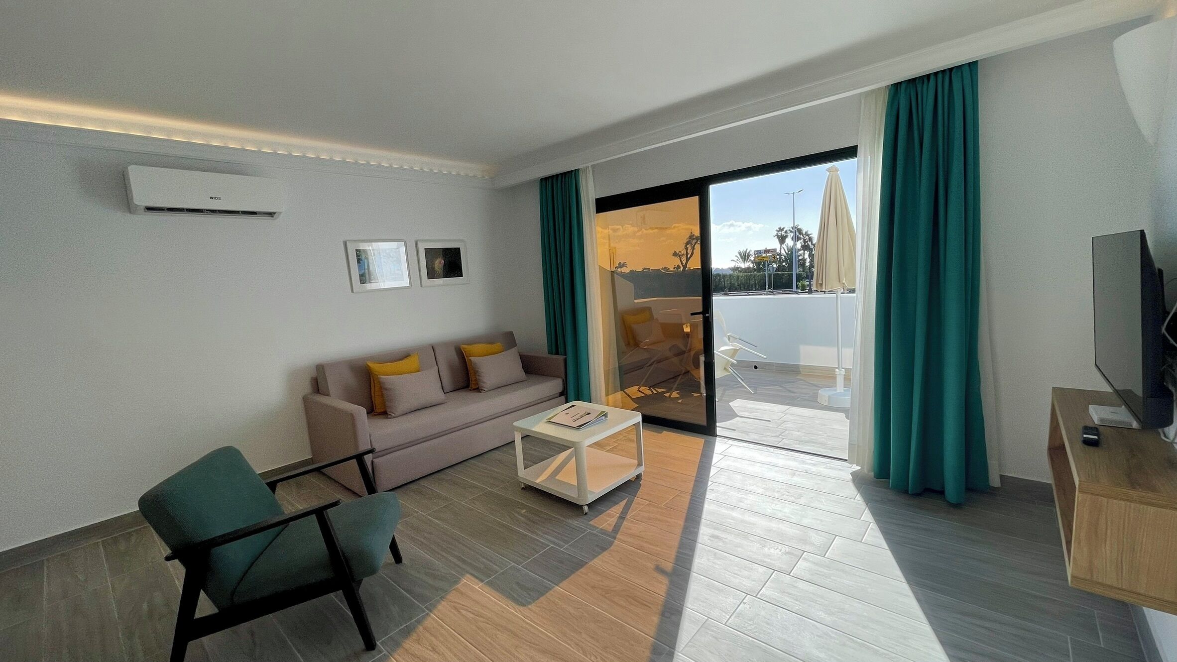 Superior Double Apartment | Living area | 43-inch Smart TV with satellite channels, books