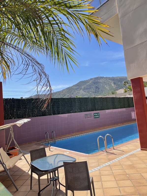 Outdoor pool, pool umbrellas, pool loungers