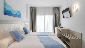 Desk, laptop workspace, blackout curtains, free WiFi