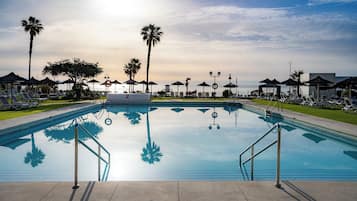 Seasonal outdoor pool, pool loungers