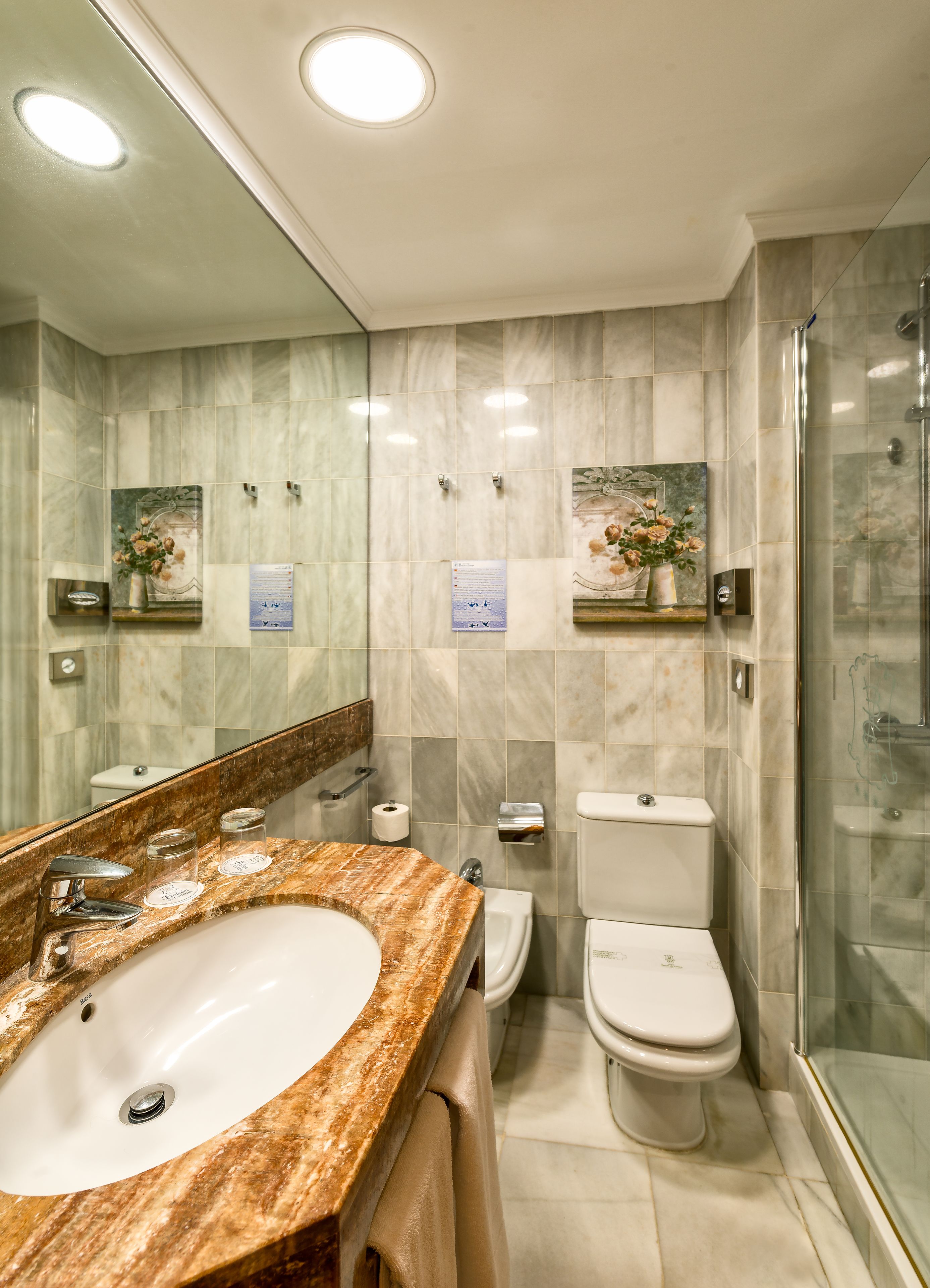 standard double room (interior courtyard view) | bathroom | hair dryer, towels, soap, shampoo