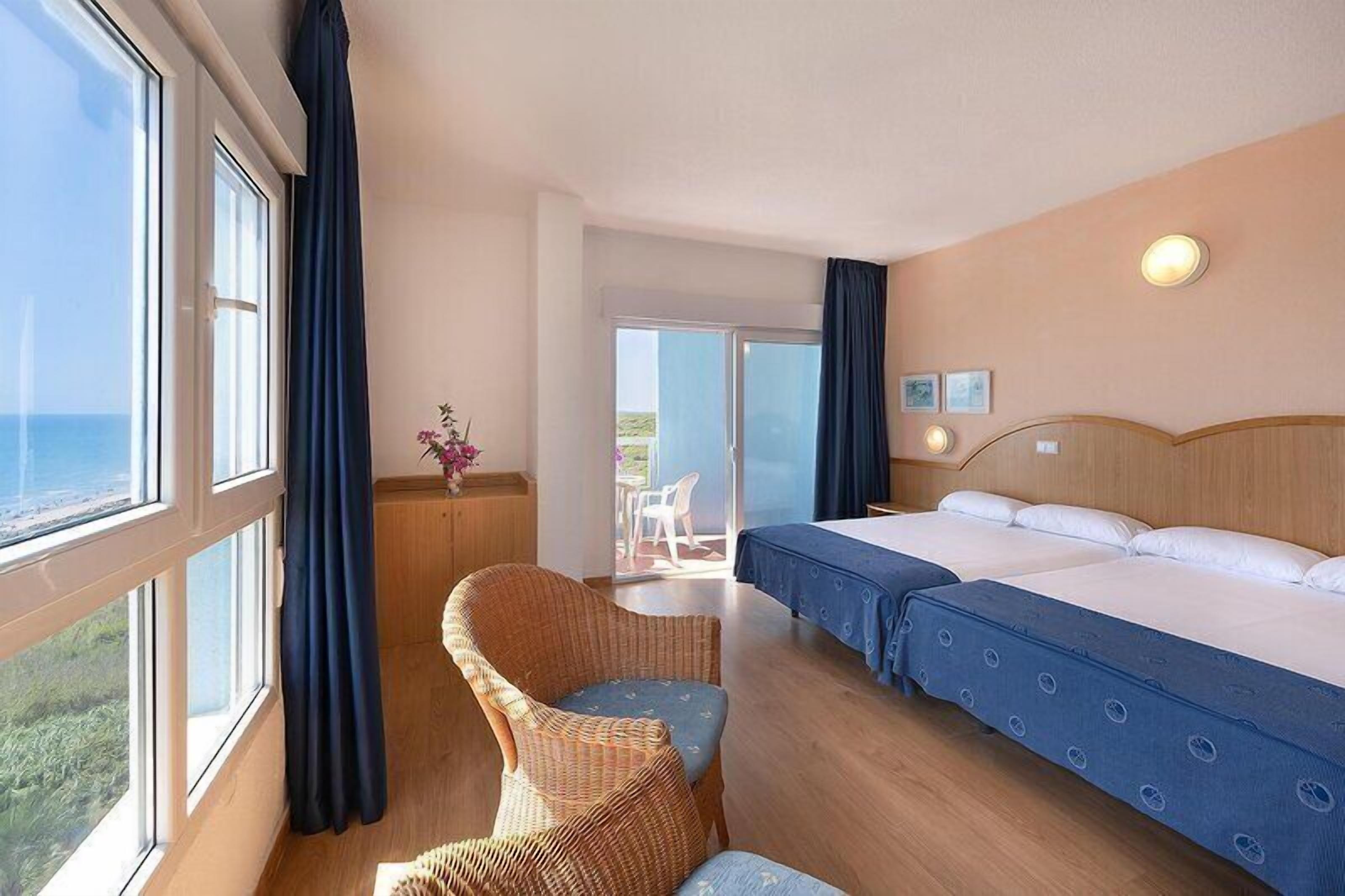 Desk, laptop workspace, free WiFi, bed sheets