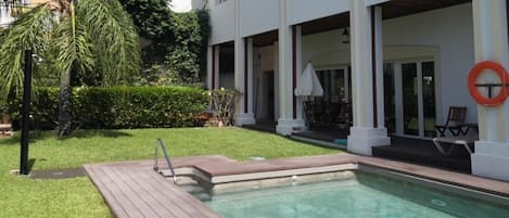 Outdoor pool, pool umbrellas, pool loungers