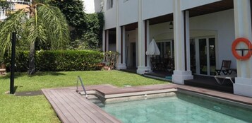Outdoor pool, pool umbrellas, pool loungers