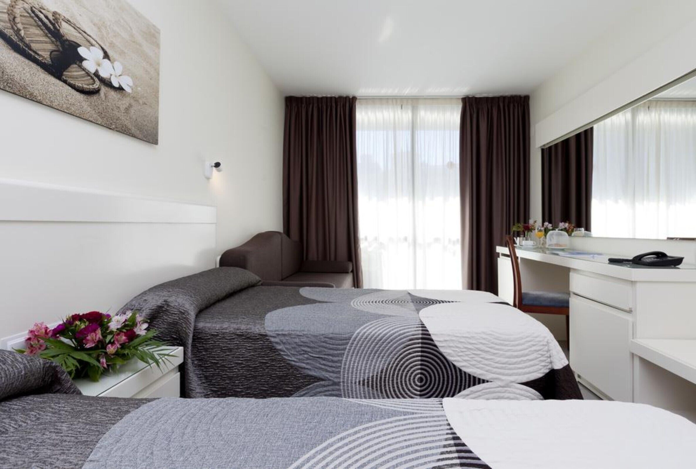 Desk, blackout drapes, WiFi (free), bed sheets