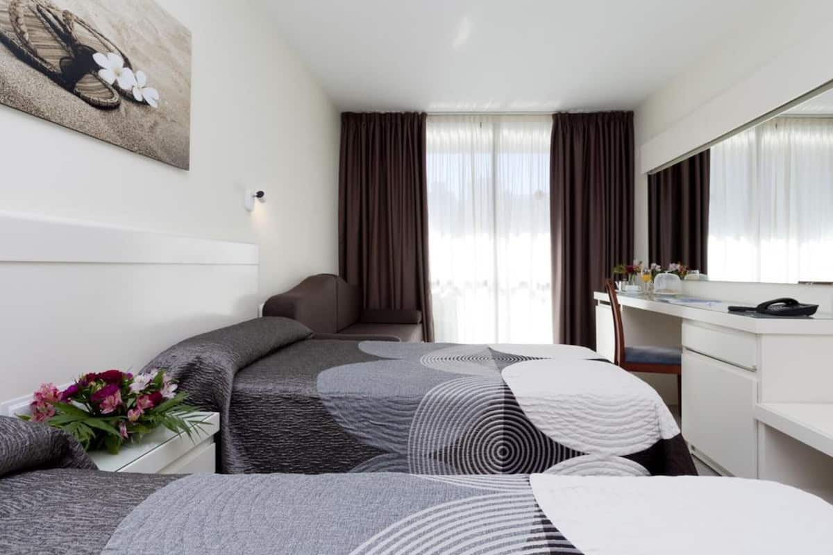 Desk, blackout drapes, WiFi (free), bed sheets