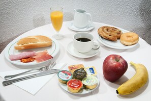 Enjoy a delicious breakfast with a selection of pastries, fresh fruit, and hot beverages.