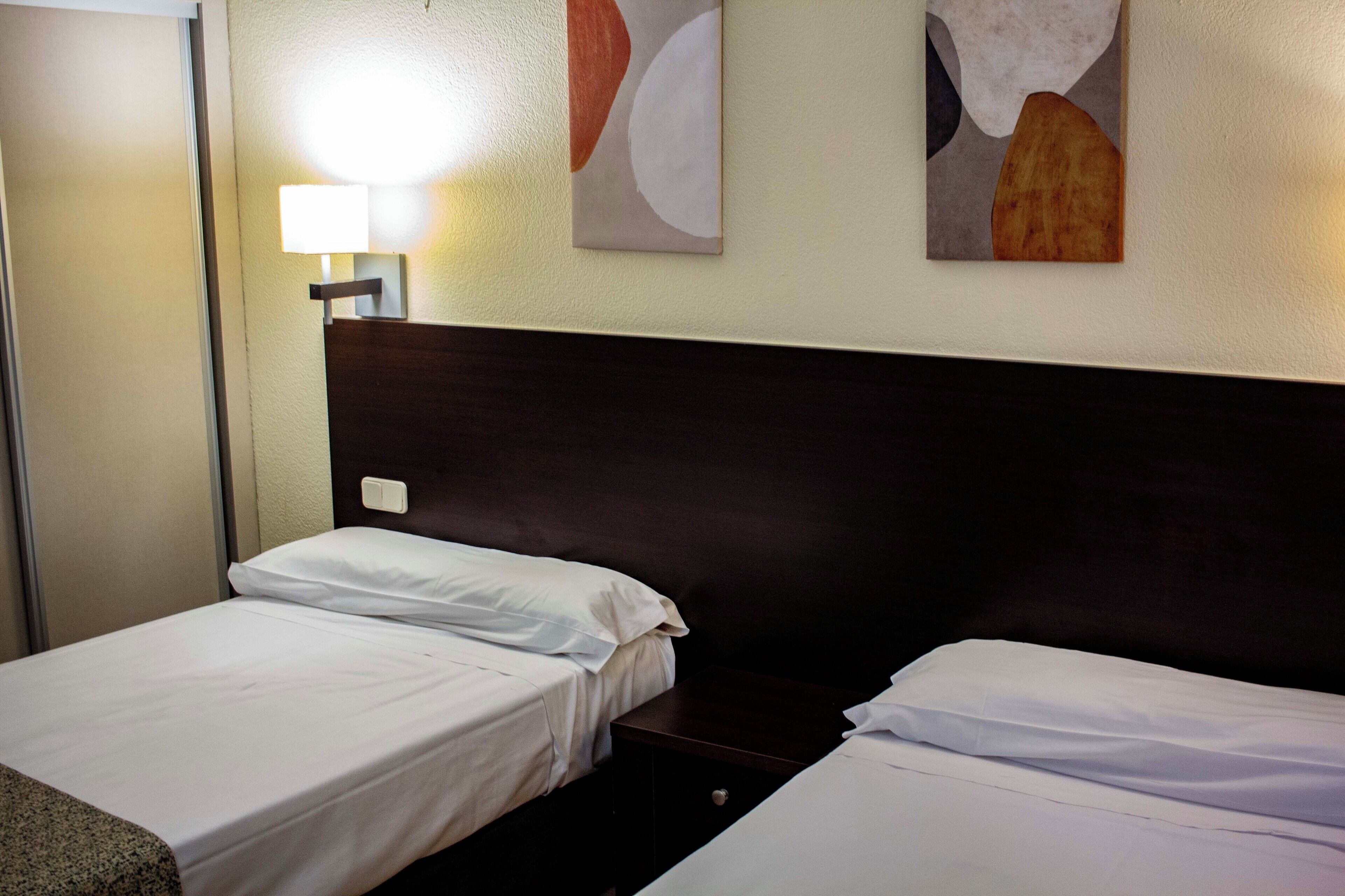 desk, blackout curtains, soundproofing, cots/infant beds