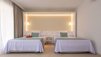 Ropa de cama de alta calidad, minibar, escritorio y cortinas opacas