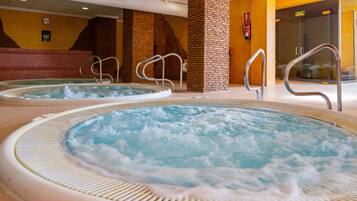 Seasonal outdoor pool, open 10:00 AM to 7:00 PM, pool umbrellas