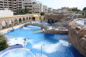 Indoor pool, seasonal outdoor pool, pool umbrellas