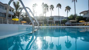 2 outdoor pools, pool umbrellas, sun loungers