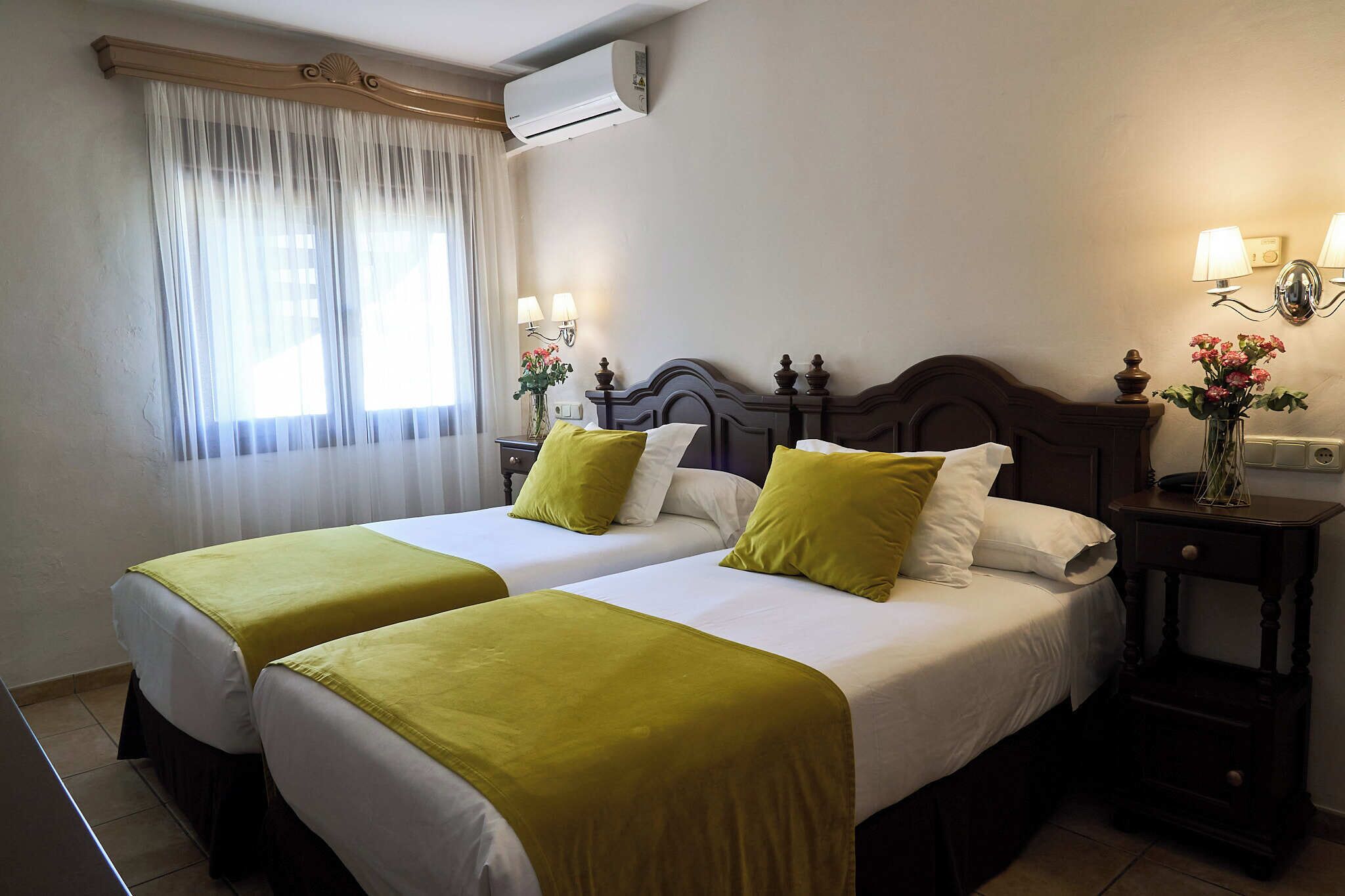 twin room | 1 bedroom, minibar, in-room safe, individually decorated