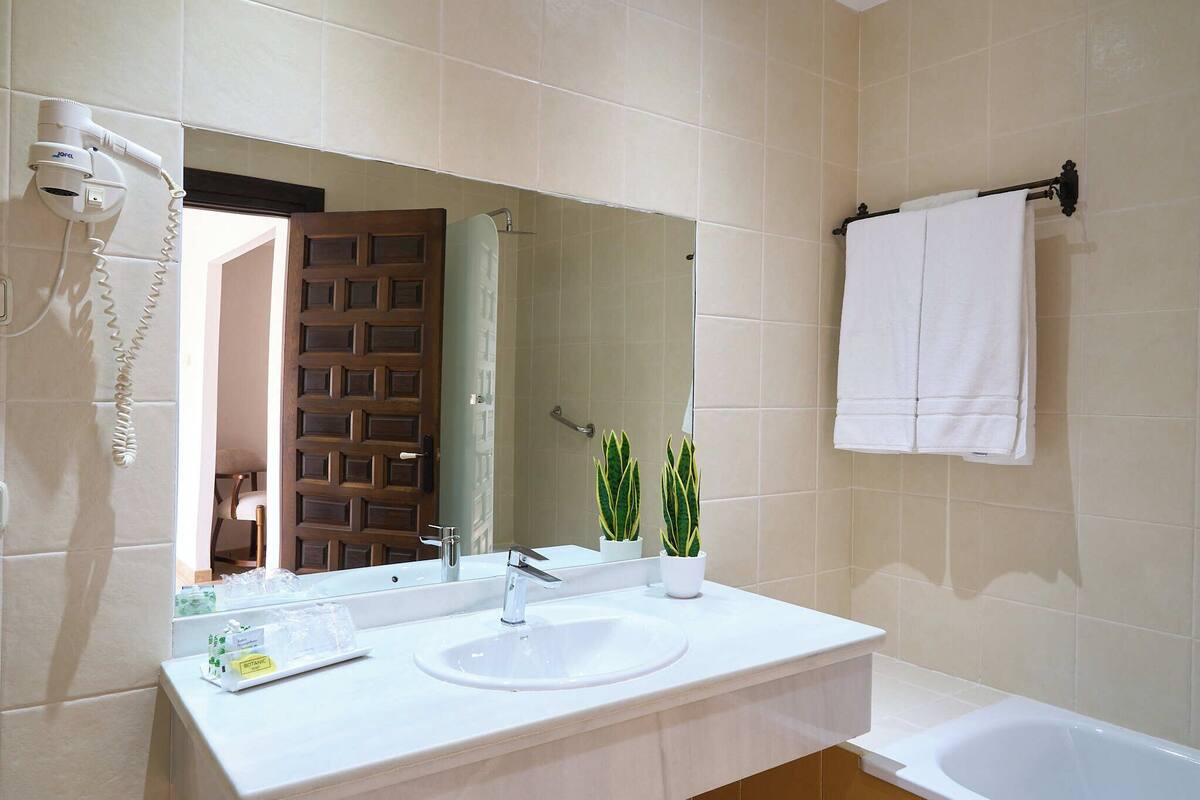 twin room | bathroom | bathtub, hair dryer, bidet, towels