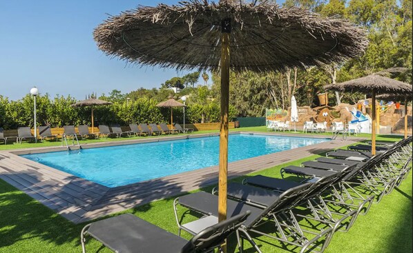 2 outdoor pools, open 10:00 AM to 9:00 PM, pool umbrellas, pool loungers