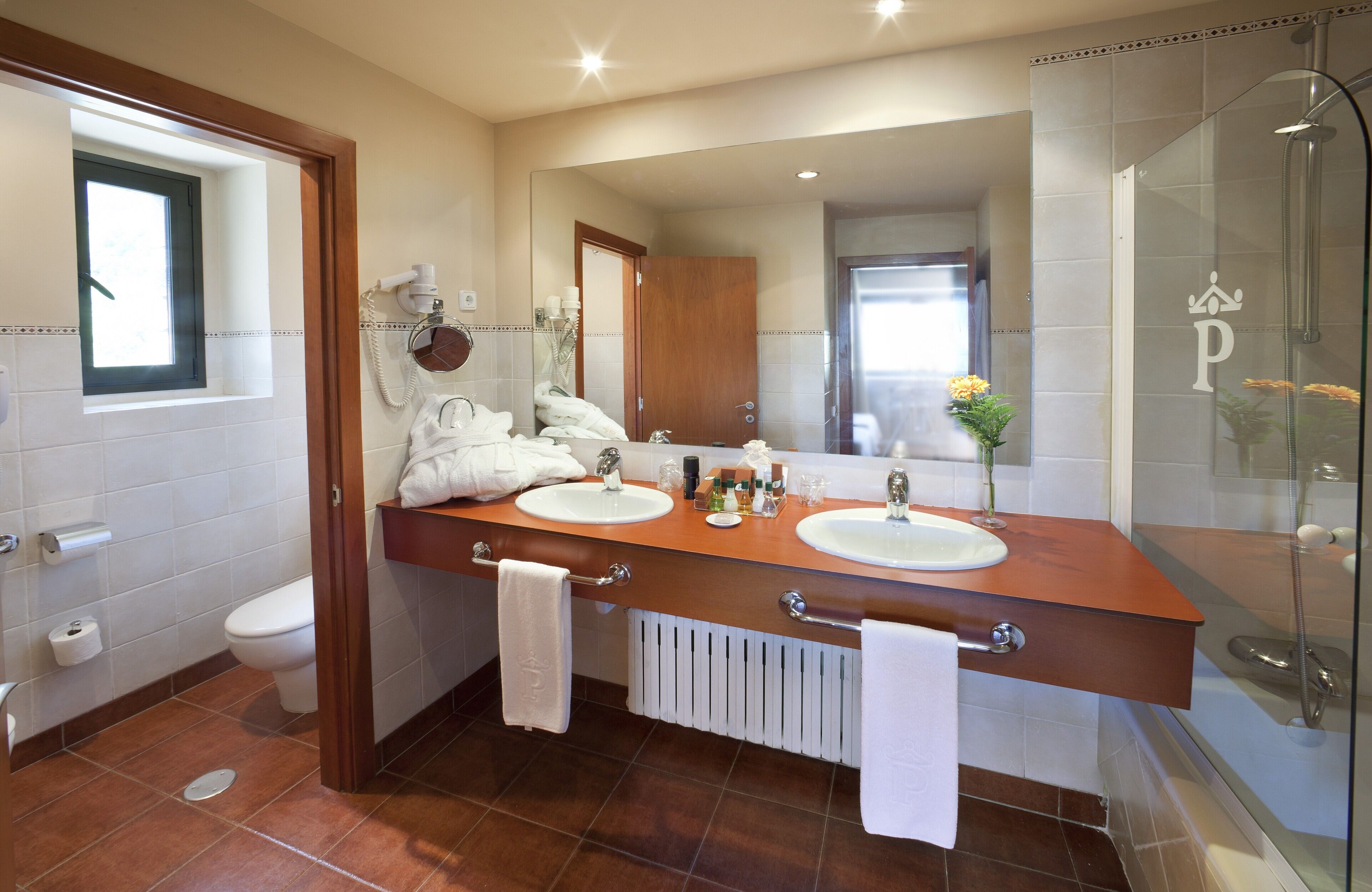 bathtub, free toiletries, hair dryer, slippers