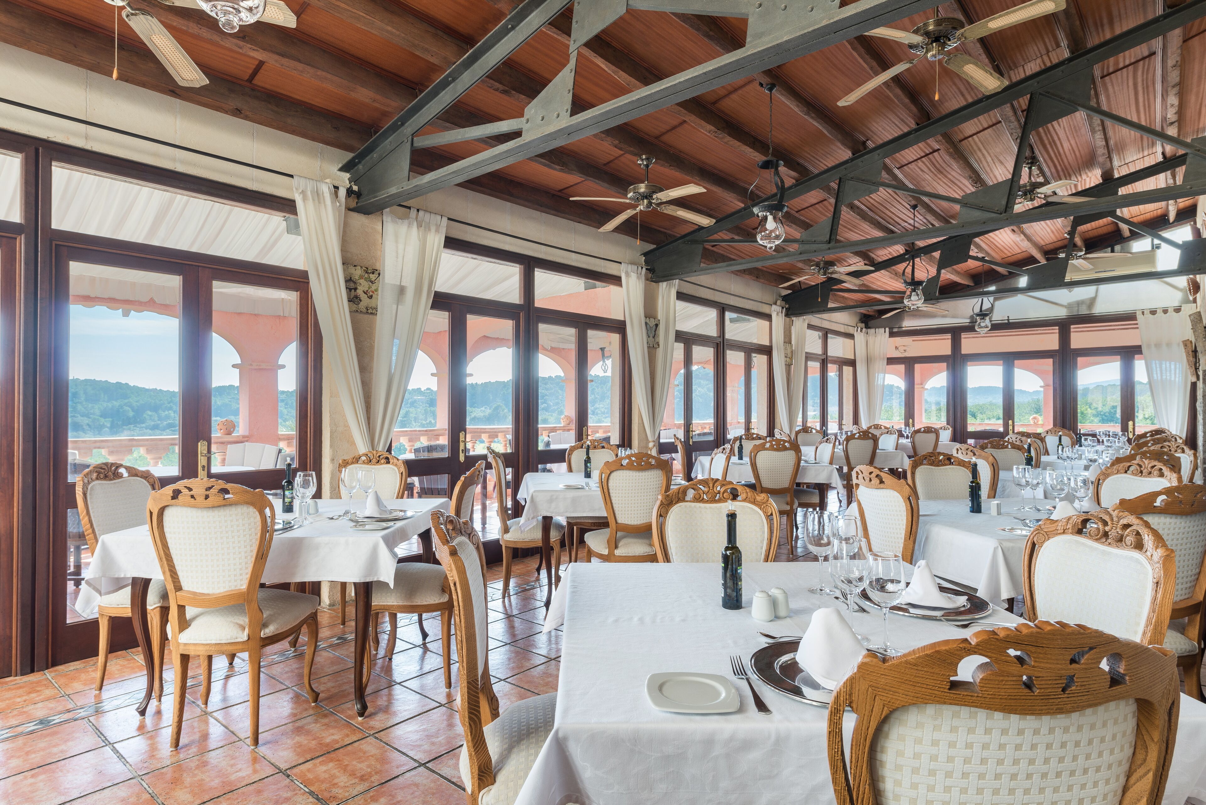 Lunch, dinner served; Mediterranean cuisine, garden views 