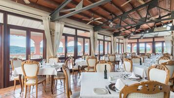 Lunch, dinner served; Mediterranean cuisine, garden views