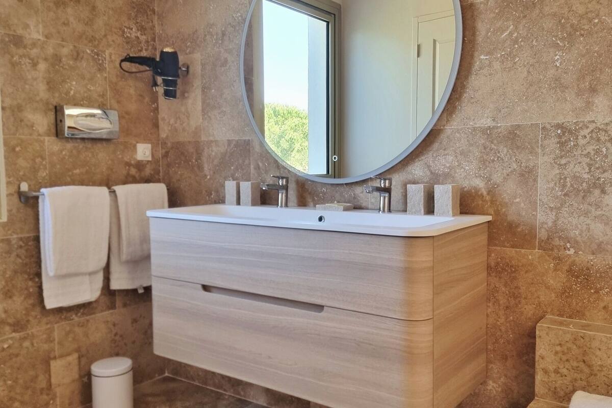 family room | 1 bedroom, minibar, in-room safe, individually decorated