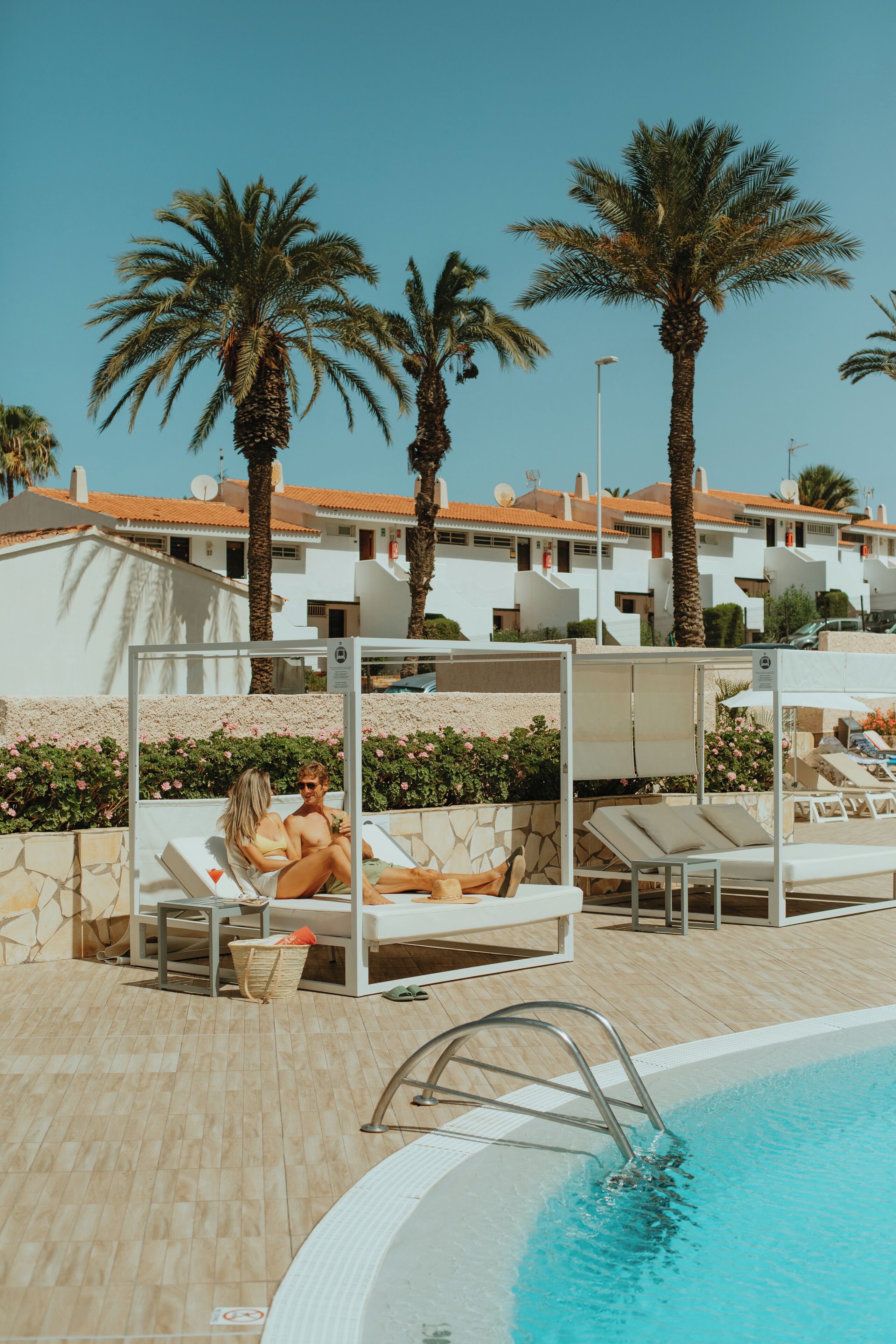 outdoor pool, pool umbrellas, pool loungers