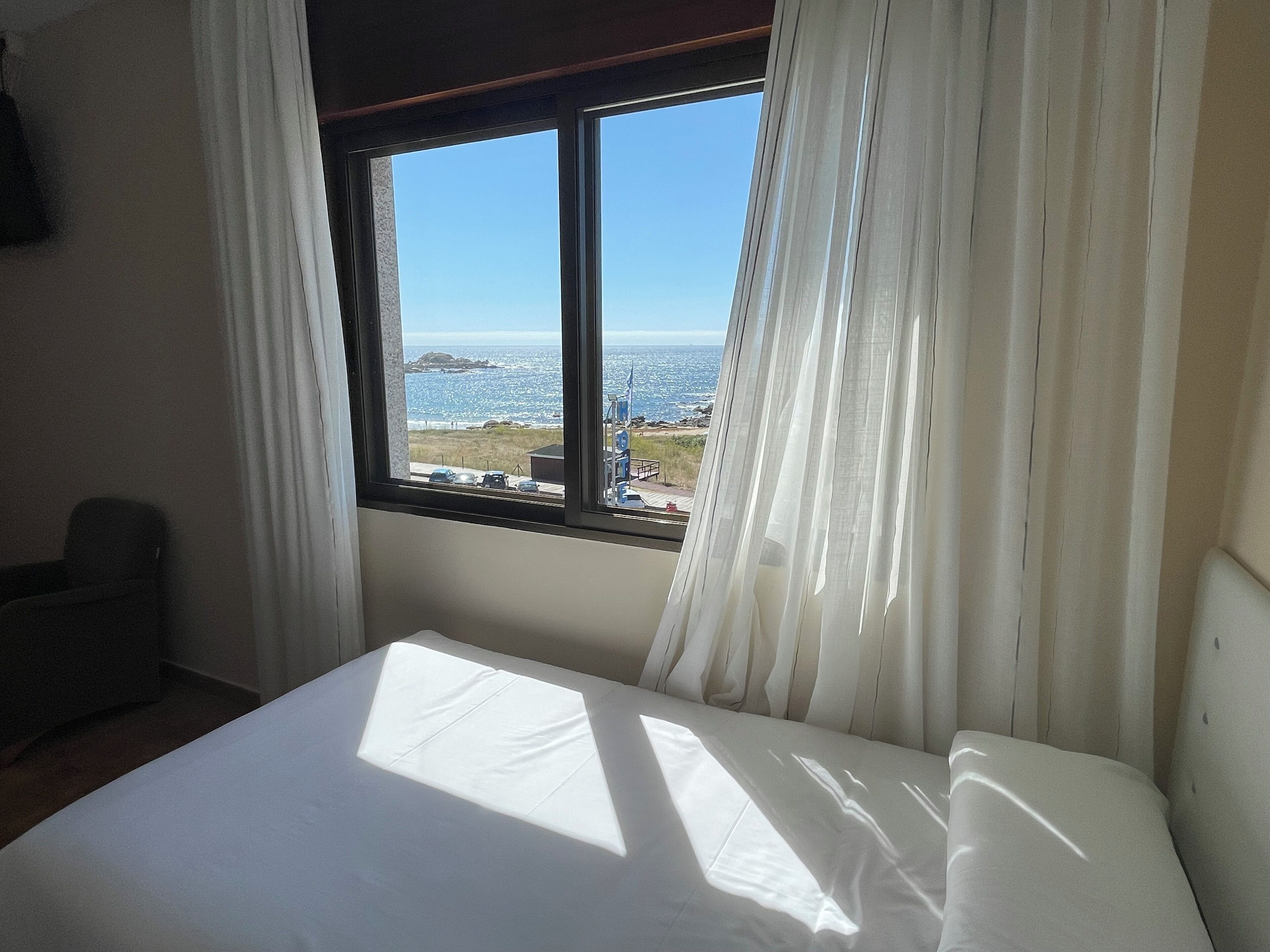 quad room for 2 adults and 2 children | select comfort beds, individually decorated, desk, iron/ironing board