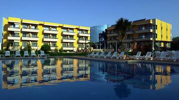 Indoor pool, seasonal outdoor pool, pool umbrellas, sun loungers
