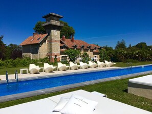 Outdoor pool, open 8 AM to 10 PM, pool cabanas (surcharge)