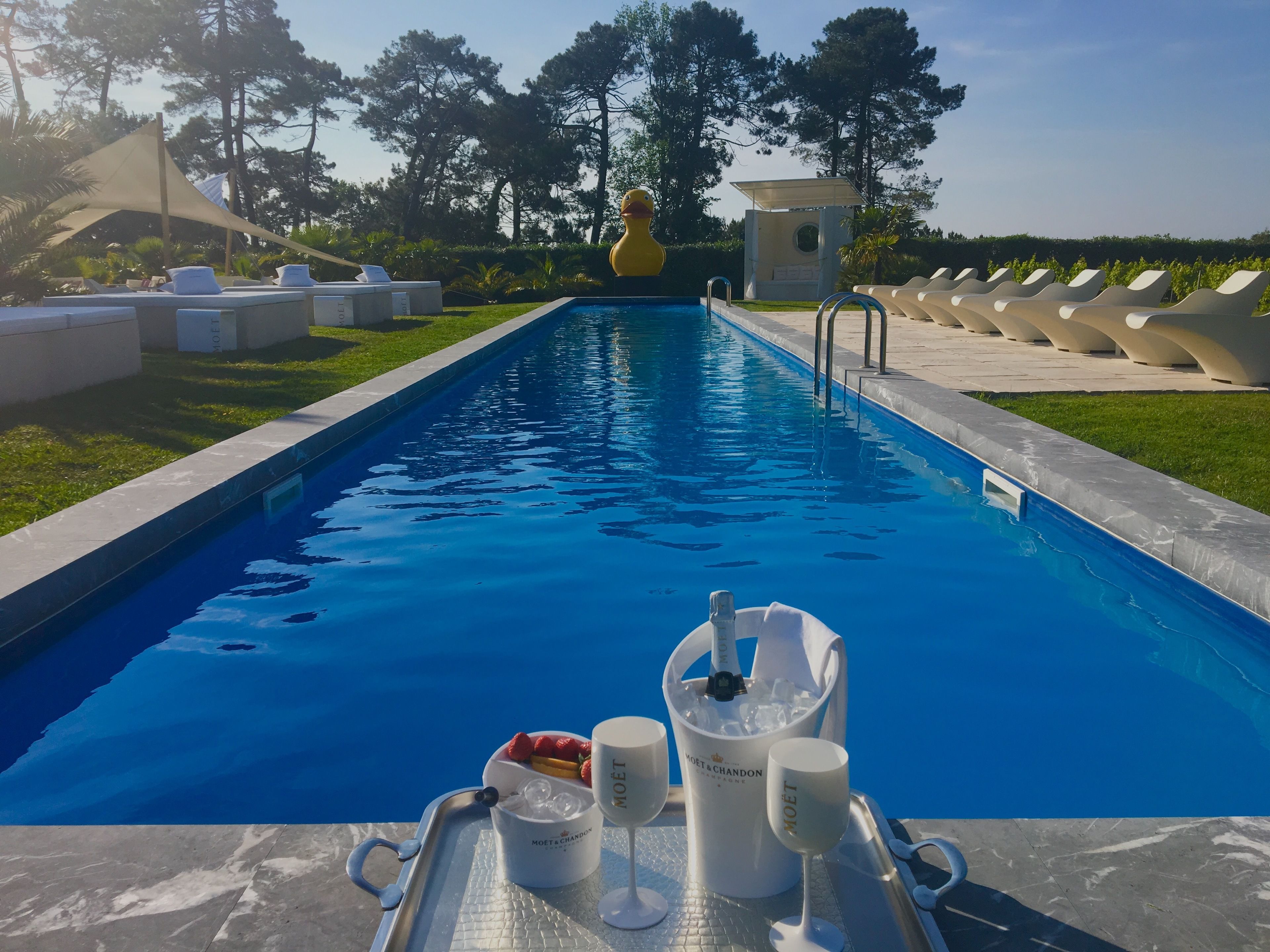 Outdoor pool, open 8 AM to 10 PM, pool cabanas (surcharge)