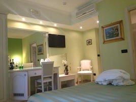 Deluxe Double Room, Balcony | Premium bedding, desk, laptop workspace, blackout drapes