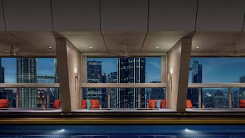 Indoor pool, open 7:00 AM to 6:00 PM, pool loungers