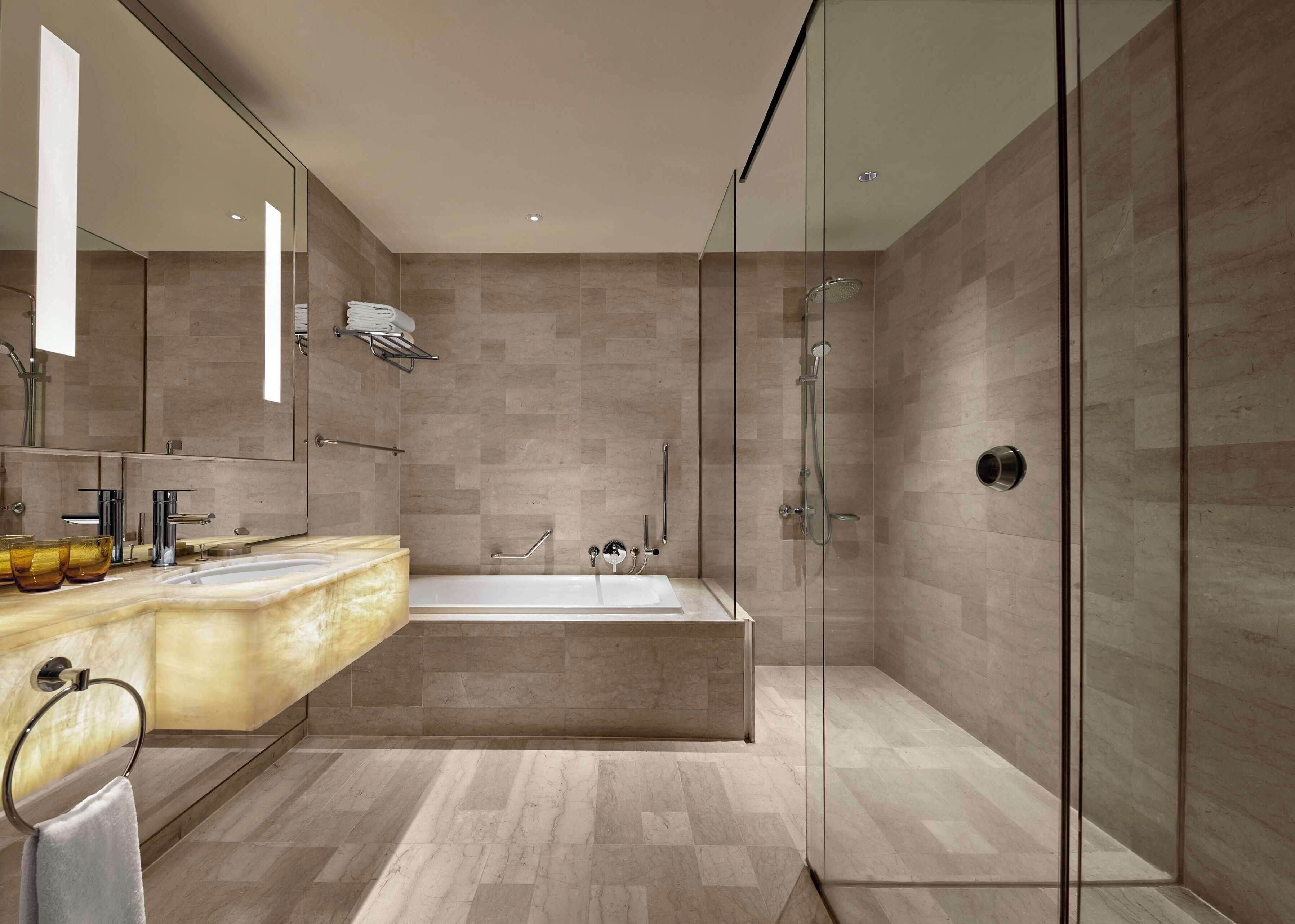 suite, 1 king bed, city view | bathroom | separate bathtub and shower, deep-soaking bathtub, rainfall showerhead