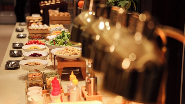 A buffet table with various food items and condiments. - Zhongan Hotel Beijing (Beijing)