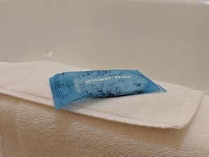A white towel with a blue soap bar on it. - Holiday Inn Express & Suites Claypool Hill (Richlands Area) by IHG (Pounding Mill)